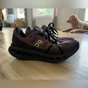 On Running Athletic Shoes in Dark Brown and Black